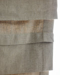 Coudre curtain extensions layered at the hem