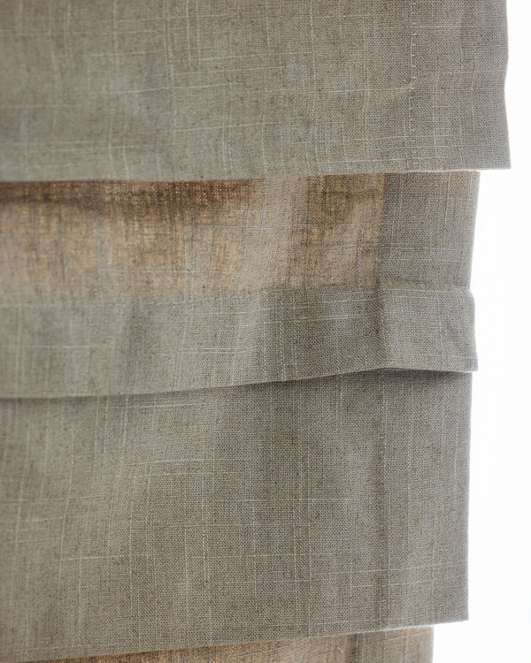 Coudre curtain extensions layered at the hem