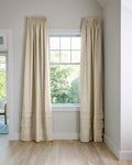 Coudre curtains in a living room